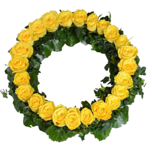 Krans av gula rosor arrangerade i en cirkel, omgiven av gröna löv.